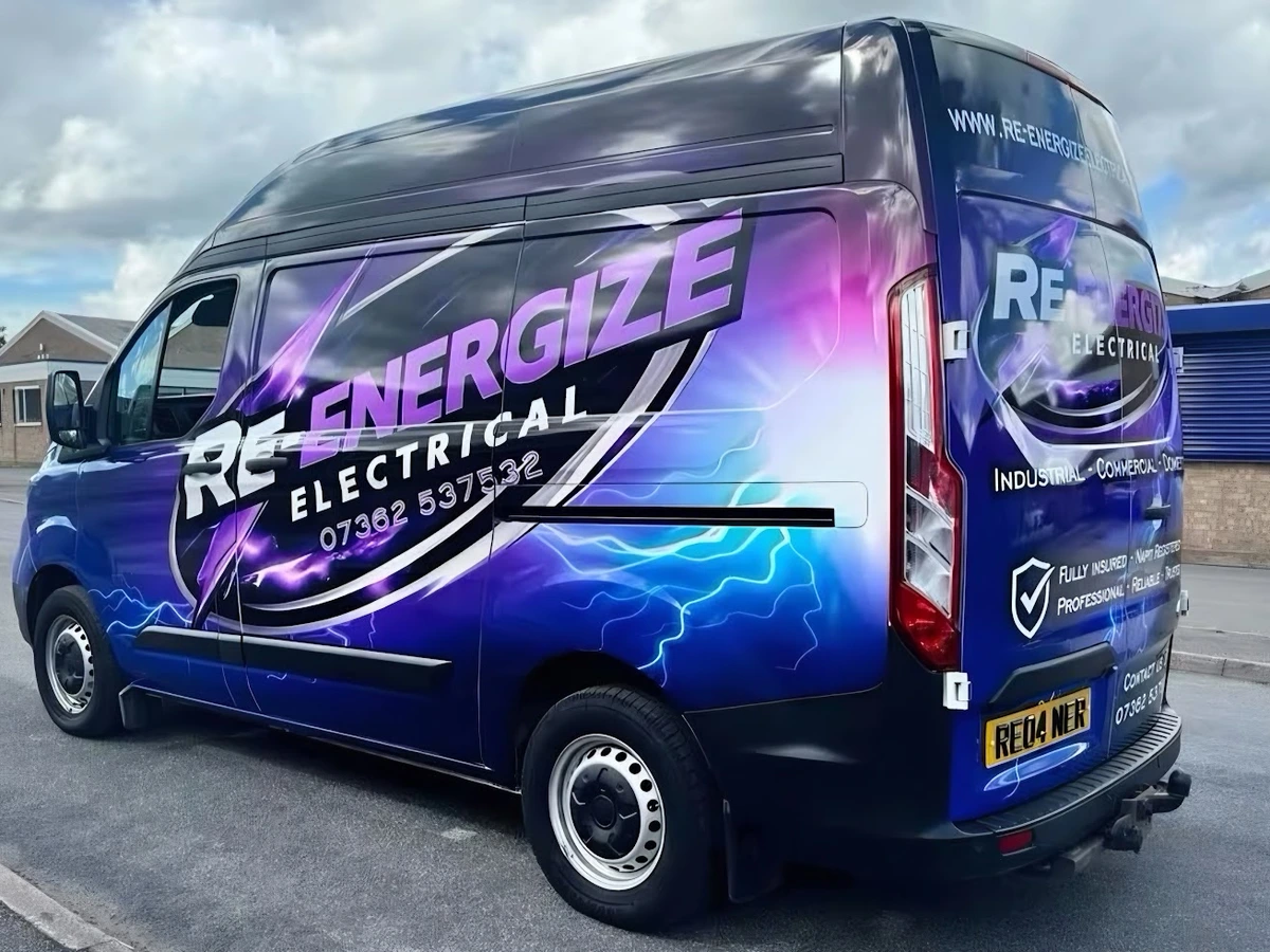 Re-energize Electrical van parked on a residential street