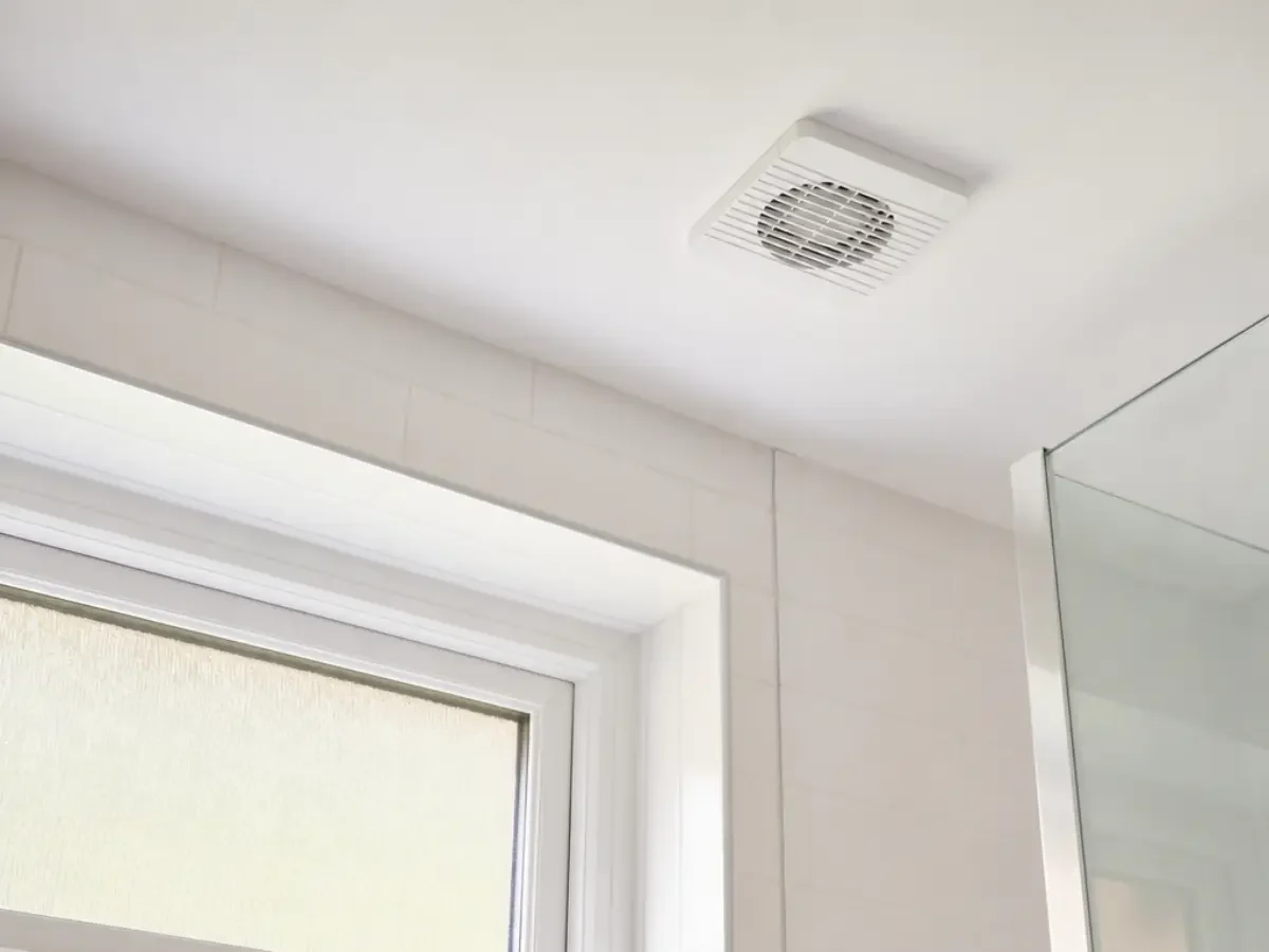 Illustration of a ceiling extractor fan in a bathroom by Re-energize Electrical